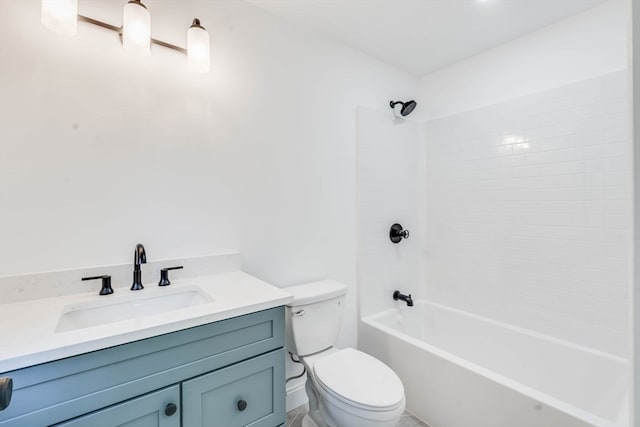 full bathroom with toilet, tiled shower / bath, and vanity