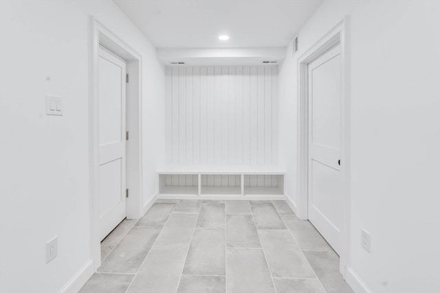 mudroom with light tile patterned flooring