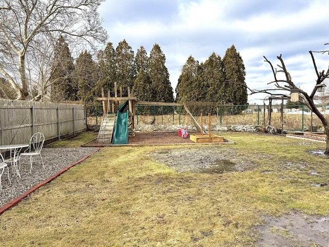 view of yard with a playground