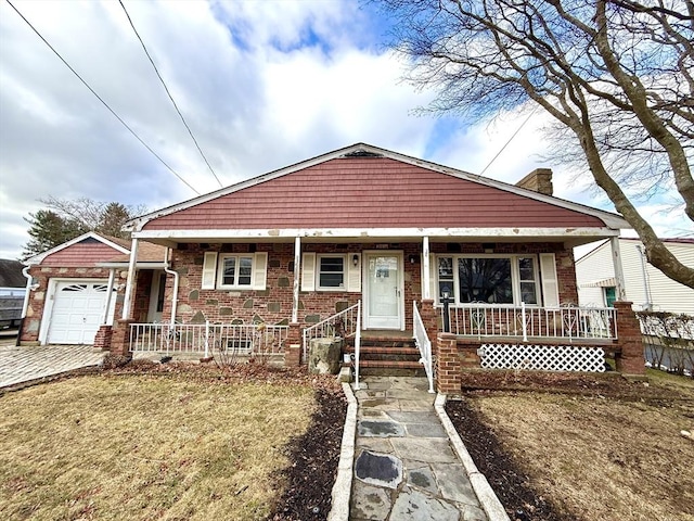 bungalow-style home with a porch and a front yard