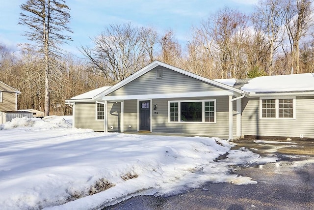 ranch-style home featuring a porch