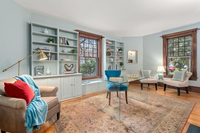 sitting room with light wood-type flooring