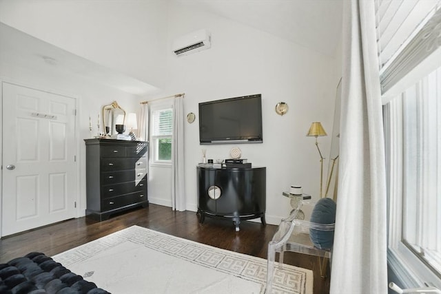 14 Turning Mill Ln Unit 14, Quincy, MA 02169 - bedroom featuring dark wood-style flooring and a wall mounted AC