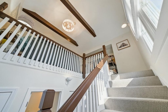 14 Turning Mill Ln Unit 14, Quincy, MA 02169 - staircase featuring a high ceiling and beam ceiling