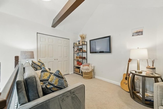 14 Turning Mill Ln Unit 14, Quincy, MA 02169 - carpeted living room featuring lofted ceiling and baseboards
