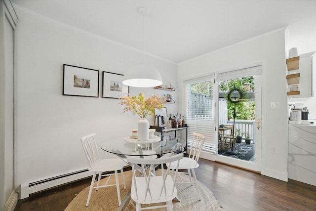 14 Turning Mill Ln Unit 14, Quincy, MA 02169 - dining space featuring ornamental molding, wood finished floors, and a baseboard heating unit