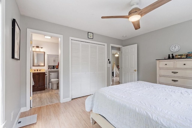 24 Joel Scott Dr, Holden, MA 01520 - bedroom with light wood finished floors, baseboards, a closet, connected bathroom, and a ceiling fan