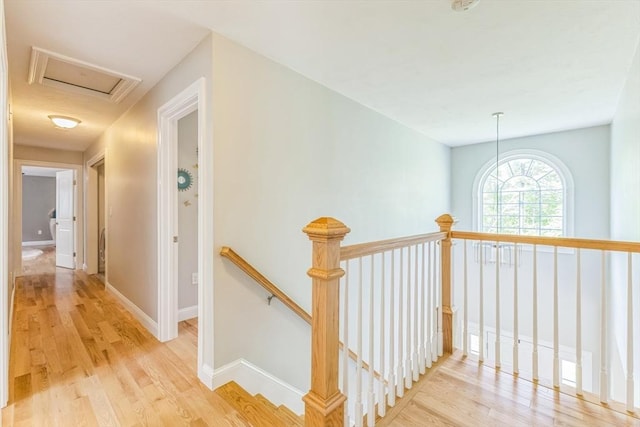 82 Sutton St, Uxbridge, MA 01569 - corridor with an upstairs landing, light wood finished floors, and baseboards