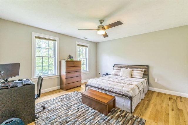 82 Sutton St, Uxbridge, MA 01569 - bedroom featuring baseboards, light wood-style flooring, a desk, and a ceiling fan