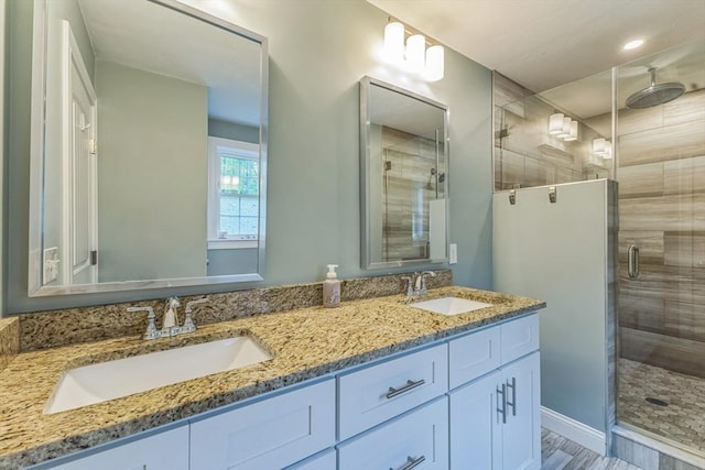 82 Sutton St, Uxbridge, MA 01569 - full bathroom featuring a stall shower and double vanity