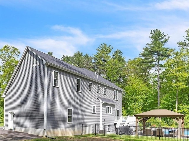 82 Sutton St, Uxbridge, MA 01569 - rear view of house with a gazebo