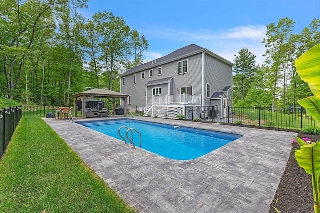 82 Sutton St, Uxbridge, MA 01569 - view of pool with a gazebo, a wooden deck, and a patio area