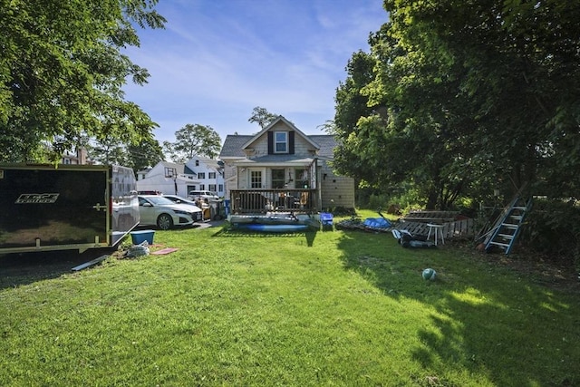 41 Endicott St, Danvers, MA 01923 - view of grassy yard featuring a deck