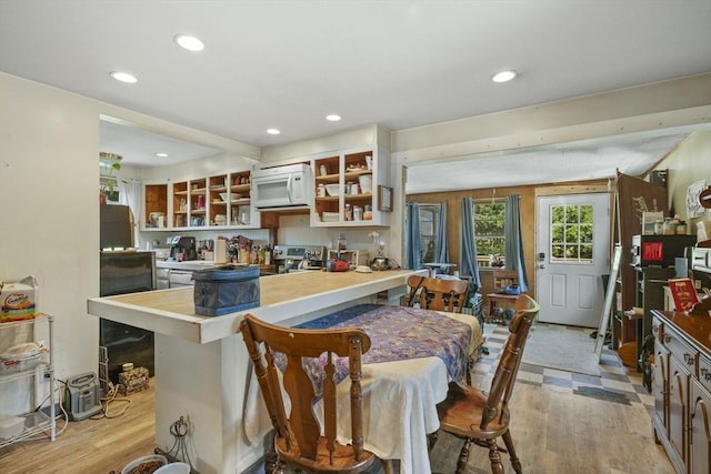 41 Endicott St, Danvers, MA 01923 - kitchen featuring white microwave, light wood-style flooring, recessed lighting, stainless steel electric stove, and open shelves