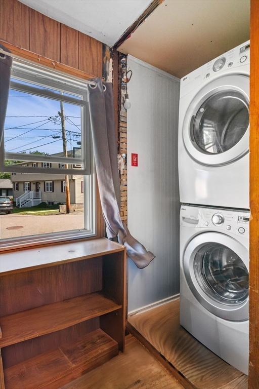 41 Endicott St, Danvers, MA 01923 - laundry room with stacked washer / drying machine and wood finished floors