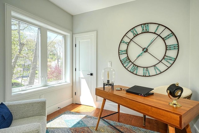 147 Ridge St, Arlington, MA 02474 - home office with baseboards and light wood-type flooring