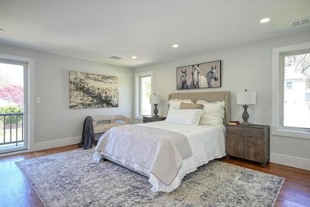 147 Ridge St, Arlington, MA 02474 - bedroom featuring visible vents, multiple windows, and access to exterior