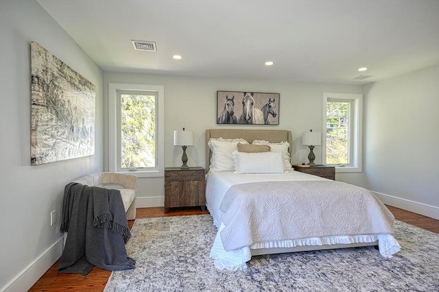 147 Ridge St, Arlington, MA 02474 - bedroom with visible vents, recessed lighting, baseboards, and wood finished floors