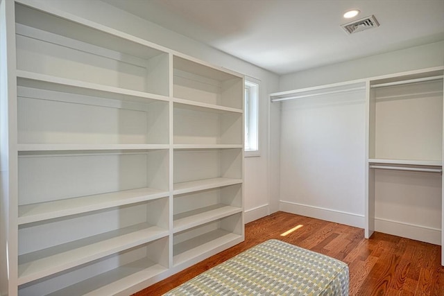147 Ridge St, Arlington, MA 02474 - walk in closet with wood finished floors and visible vents