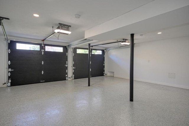 147 Ridge St, Arlington, MA 02474 - garage with baseboards, a garage door opener, and recessed lighting