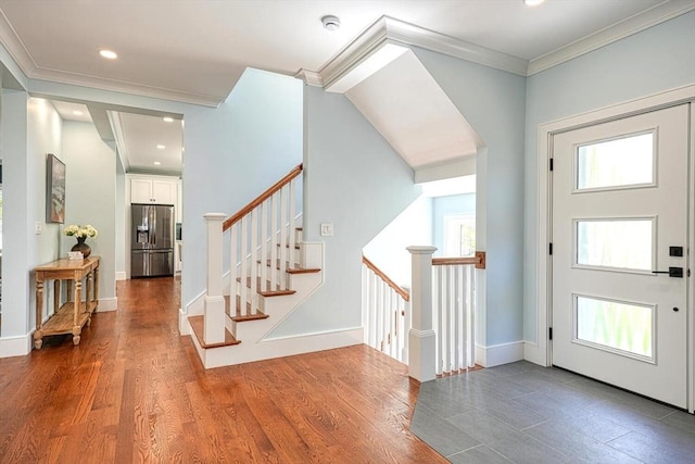 147 Ridge St, Arlington, MA 02474 - foyer entrance with crown molding, recessed lighting, baseboards, and wood finished floors