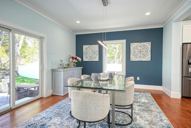 147 Ridge St, Arlington, MA 02474 - dining space with crown molding, baseboards, and a healthy amount of sunlight