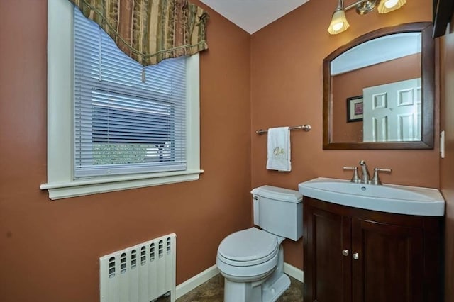 24 E St, Weymouth, MA 02189 - half bathroom featuring radiator and vanity