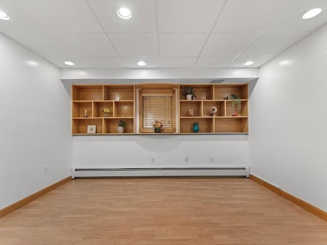 769 Edgell Rd, Framingham, MA 01701 - spare room with a baseboard radiator, baseboards, wood finished floors, recessed lighting, and a drop ceiling
