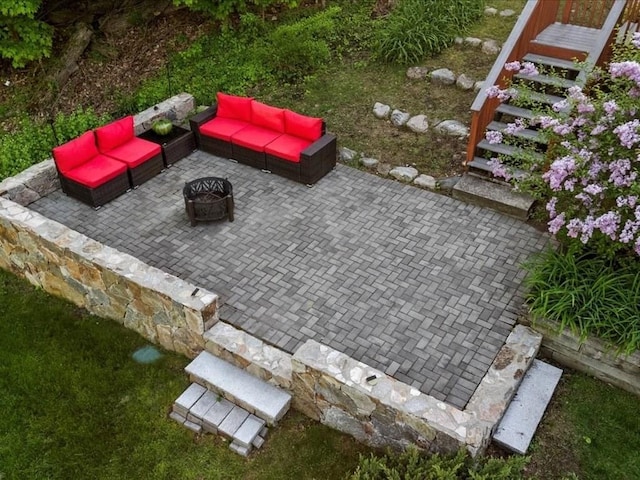 769 Edgell Rd, Framingham, MA 01701 - view of patio with an outdoor living space with a fire pit