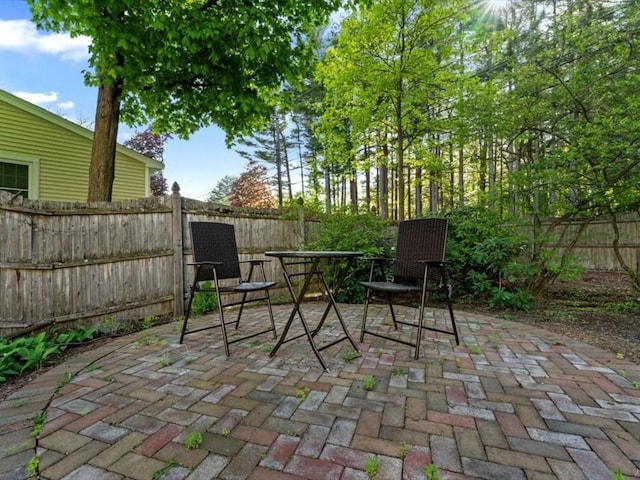 769 Edgell Rd, Framingham, MA 01701 - fenced backyard featuring a patio