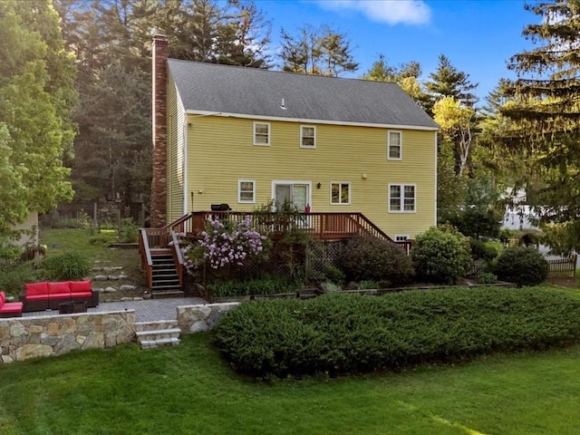 769 Edgell Rd, Framingham, MA 01701 - rear view of property with a deck, a chimney, a yard, and stairway