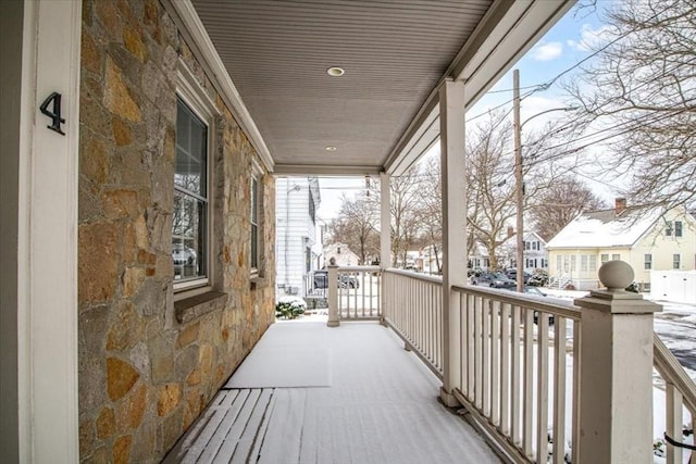 view of snow covered deck