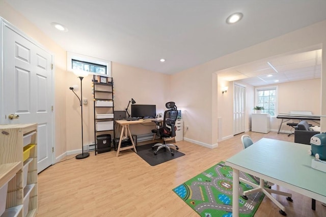 office area featuring recessed lighting, baseboards, and wood finished floors