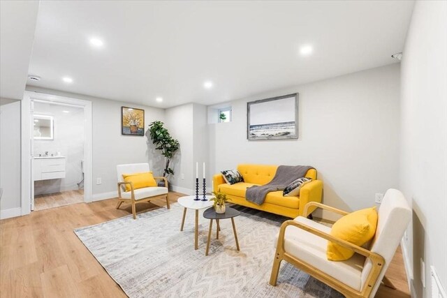 86 Cypress St Unit 8-6, Watertown, MA 02472 - living room featuring light wood-style flooring, recessed lighting, and baseboards