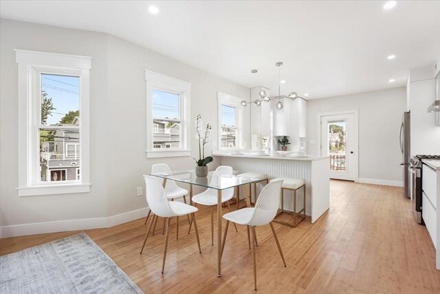 86 Cypress St Unit 8-6, Watertown, MA 02472 - dining space with baseboards, light wood-type flooring, and recessed lighting
