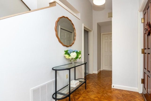 hall featuring parquet floors