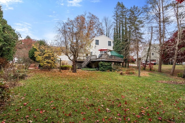 view of yard with a deck