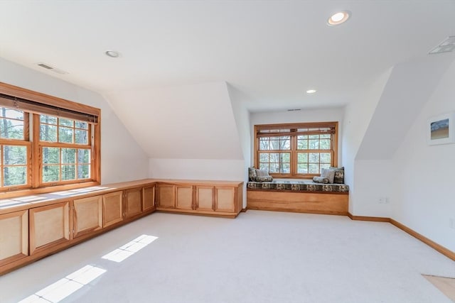 bonus room featuring light colored carpet, visible vents, baseboards, lofted ceiling, and recessed lighting