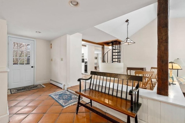 tiled foyer entrance with lofted ceiling, recessed lighting, stairway, and a baseboard radiator