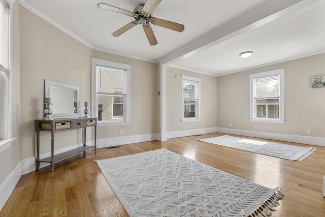 28 Mason, Salem, MA 01970 - foyer entrance featuring crown molding, ceiling fan, wood finished floors, and baseboards