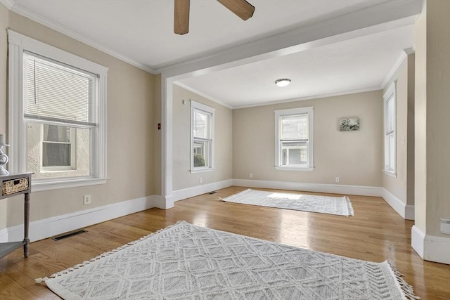 28 Mason, Salem, MA 01970 - entryway featuring ornamental molding, ceiling fan, baseboards, and wood finished floors