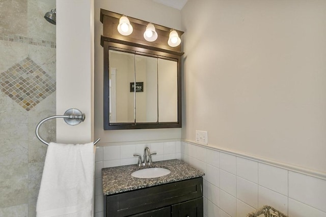 28 Mason, Salem, MA 01970 - full bathroom with vanity, tile walls, a tile shower, and a wainscoted wall