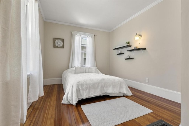 28 Mason, Salem, MA 01970 - bedroom featuring crown molding, baseboards, and wood finished floors