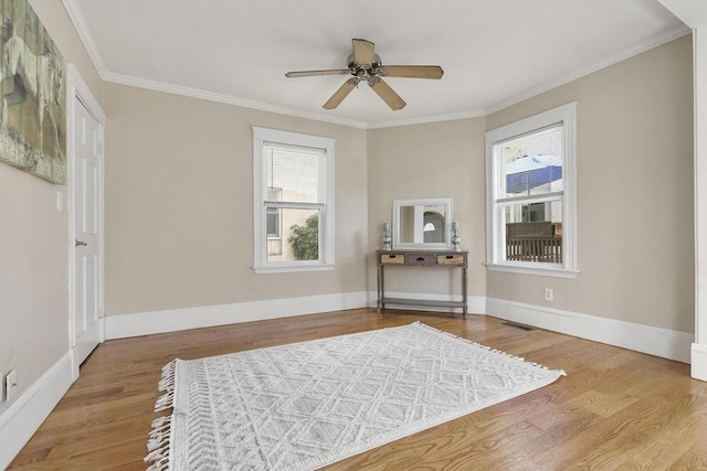 28 Mason, Salem, MA 01970 - sitting room with wood finished floors, ceiling fan, ornamental molding, and baseboards