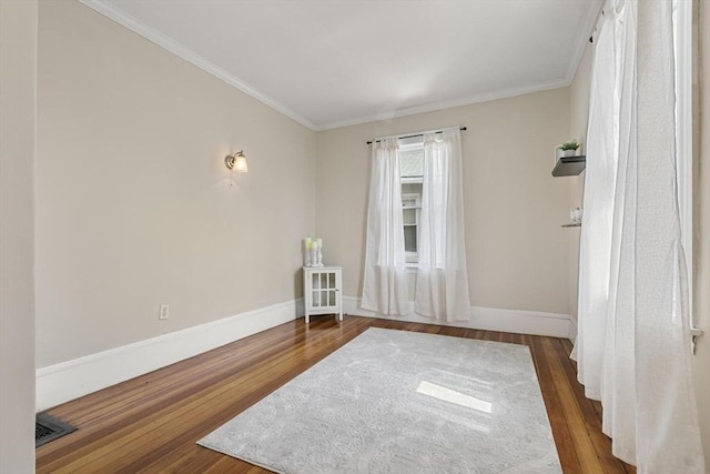28 Mason, Salem, MA 01970 - unfurnished room featuring wood finished floors, baseboards, and crown molding