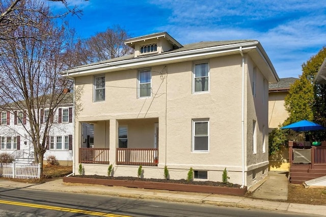 28 Mason, Salem, MA 01970 - view of front facade featuring stucco siding and a porch