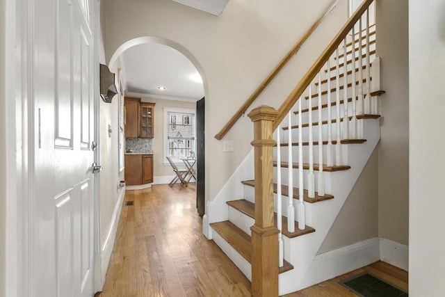 28 Mason, Salem, MA 01970 - stairs with arched walkways, wood finished floors, ornamental molding, and recessed lighting