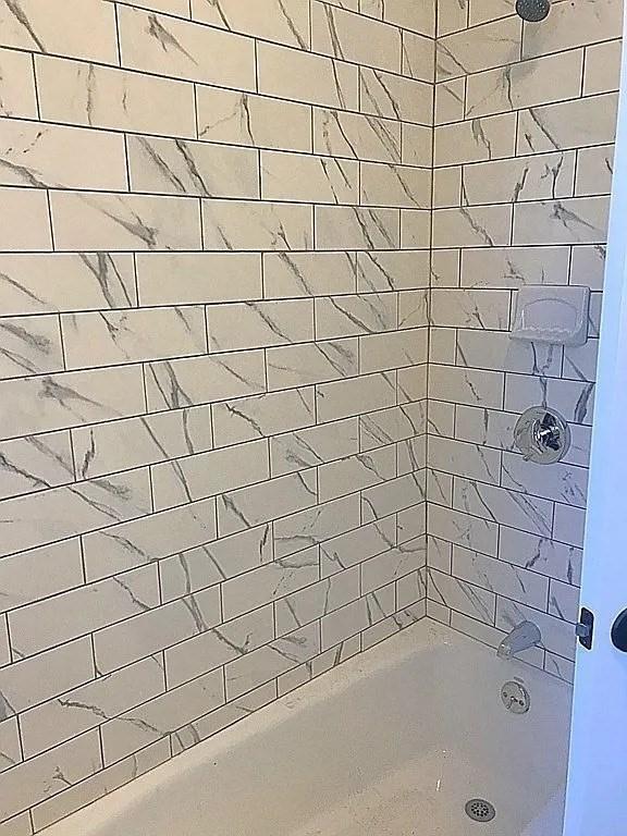 124 Grant Ave, Medford, MA 02155 - bathroom with bathing tub / shower combination