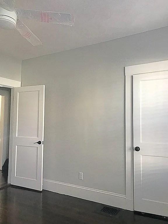 124 Grant Ave, Medford, MA 02155 - spare room featuring baseboards