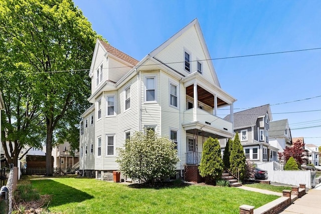 124 Grant Ave, Medford, MA 02155 - view of front facade featuring a balcony